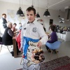 \"Elst, 4-3-2012 . open dag woonvorm verstandelijk gehandicapten in  het Thomashuis . Olivier, bewoner verwent zijn gasten met koffie en bonbons\"