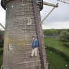 \"Wijchen, 3-5-2012 . molen (bronckhorstlaan 11)  molenwerkers zijn bezig in wieken\"
