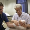 Roeland Verwegen heeft bijzondere ok gehad, Hij heeft twee tenen op de plaats van 2 vingers gekregen, met fysioth. marijke tolsma . Nijmegen, 10-7-2014 . dgfoto.