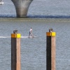 motorsurfer op het water Spiegelwaal, mooi weer!. Nijmegen, 30-3-2017 .