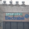 \"Nijmegen, 18-12-2009 . Aktievoerders hangen spandoek: \'STOP CO2\'  aan gevel electriciteitsmaatschappij Electrabel ivm klimaatconferentie\"