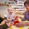 \"Nijmegen, 22-4-2010 . consultatiebureauverpleegkundige  Monique Geurts in actie met een baby of peuter bij GGD\"