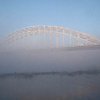 \"Nijmegen, 20-12-2010 . Mist aan de Waalkade met Waalbrug\"