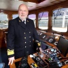 \"Nijmegen, 8-4-2011 . Kapitein Jan Tensen in stuurhut van zijn schip de Royal Crown, ivm songfestival\"