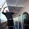 \"Nijmegen, 7-4-2011 . Schip, boot Royal Crown in haven klaar om de drie J\'s naar het songfestival te vervoeren met luxe kamers, keuken, kok enzo. laatste stukje schilderen\"