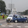 \"Nijmegen, 6-8-2011 . Verkeersongeluk op Trajanusplein, Waalbrug met 4 auto\'s en 8 gewonden.Een van de gewonden is in het ziekenhuis overleden.\"