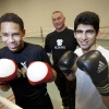 \"Nijmegen, 22-1-2012 . Boksers Milad Zamani en Elaige Camara met trainer Willy van Haaren\"